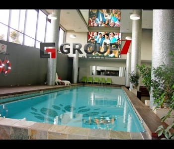Indoor pool with large screen entertainment