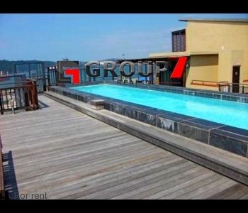 Rooftop pool and entertainment area